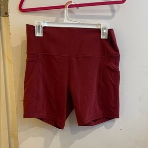 Athleta Women's Burgundy Salutation Stash Pocket II 7” Shorts